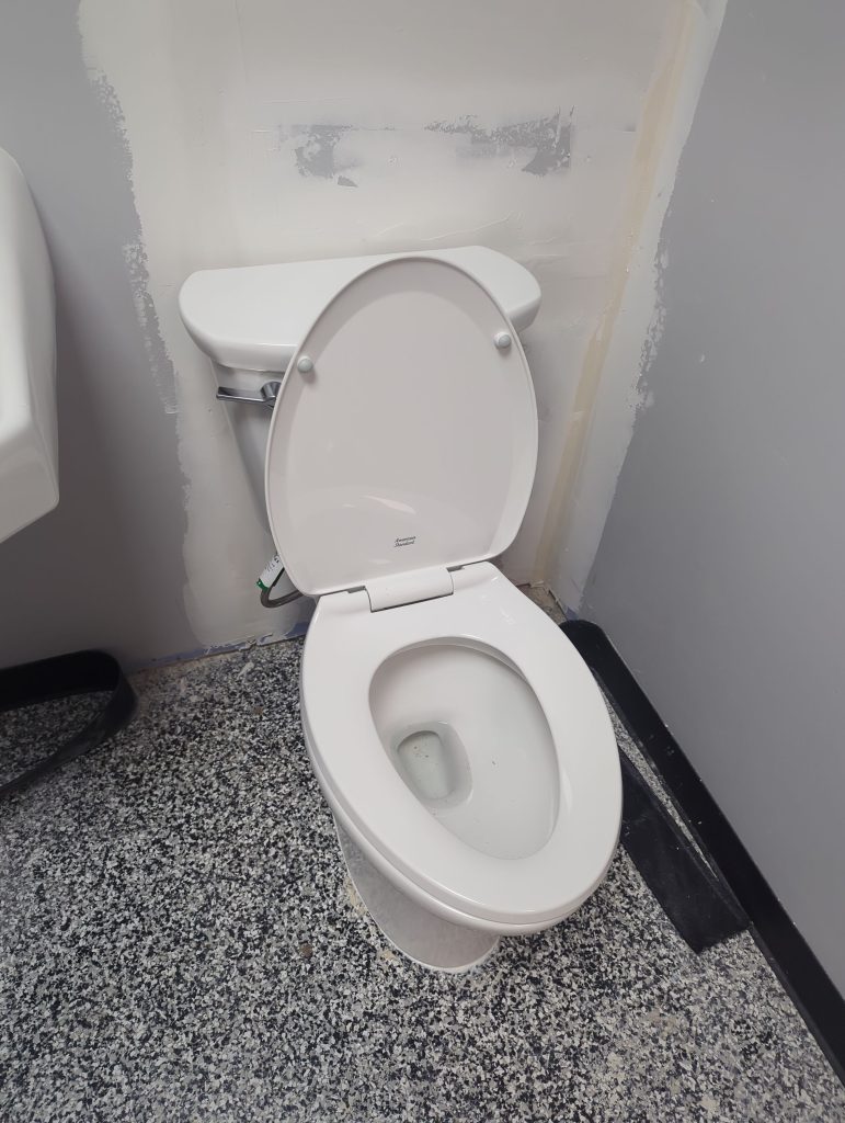 New toilet installed in a commercial restroom